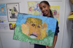 Student with their monkey painting
